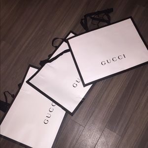 3 authentic Gucci shopping bags